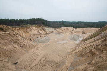 City Cesis, Latvia. A working sand quarry with a ditch excavated. Travel photo 2. november 2019.