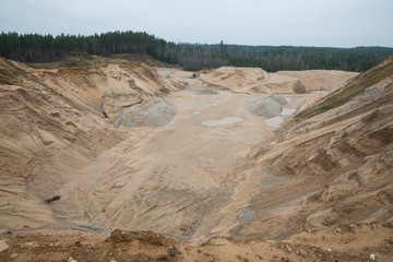 City Cesis, Latvia. A working sand quarry with a ditch excavated. Travel photo 2. november 2019.