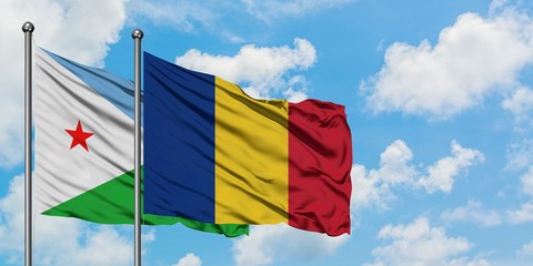 Djibouti and Romania flag waving in the wind against white cloudy blue sky together. Diplomacy concept, international relations.