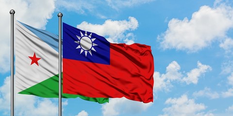 Djibouti and Taiwan flag waving in the wind against white cloudy blue sky together. Diplomacy concept, international relations.