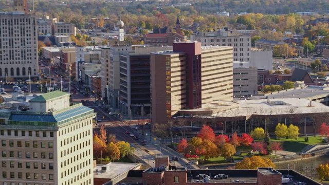 Flint Michigan Aerial v2 Sweeping panoramic of downtown cityscape with river - October 2017