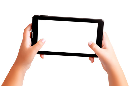 Closeup of the hands of a little white boy holding a black tablet PC and playing mobile games. Blank white screen for picture or text. Copy space, clipping path, isolated on white background.