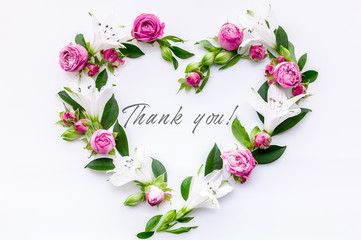 Heart frame roses and buds on a white background. Decorative floral element for design of greeting or postcards. Caption: Thank You