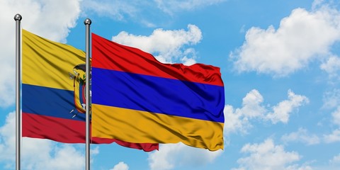 Ecuador and Armenia flag waving in the wind against white cloudy blue sky together. Diplomacy concept, international relations.
