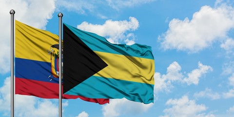 Ecuador and Bahamas flag waving in the wind against white cloudy blue sky together. Diplomacy concept, international relations.