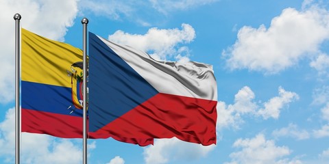 Ecuador and Czech Republic flag waving in the wind against white cloudy blue sky together. Diplomacy concept, international relations.