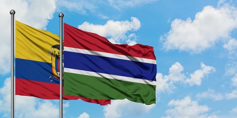 Ecuador and Gambia flag waving in the wind against white cloudy blue sky together. Diplomacy concept, international relations.