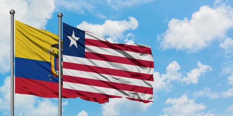 Ecuador and Liberia flag waving in the wind against white cloudy blue sky together. Diplomacy concept, international relations.