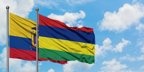 Ecuador and Mauritius flag waving in the wind against white cloudy blue sky together. Diplomacy concept, international relations.