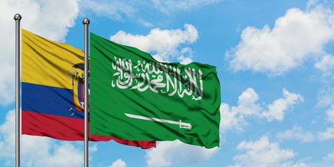 Ecuador and Saudi Arabia flag waving in the wind against white cloudy blue sky together. Diplomacy concept, international relations.