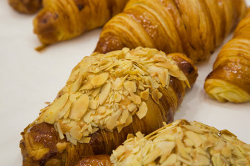 A few croissants with almond crumbs