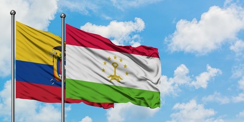 Ecuador and Tajikistan flag waving in the wind against white cloudy blue sky together. Diplomacy concept, international relations.