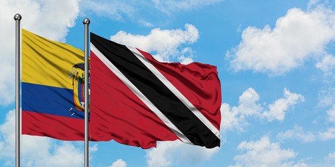 Ecuador and Trinidad And Tobago flag waving in the wind against white cloudy blue sky together. Diplomacy concept, international relations.