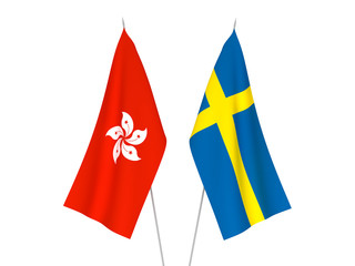 National fabric flags of Sweden and Hong Kong isolated on white background. 3d rendering illustration.