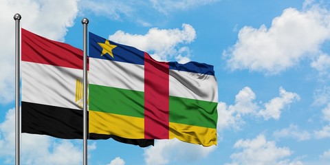 Egypt and Central African Republic flag waving in the wind against white cloudy blue sky together. Diplomacy concept, international relations.