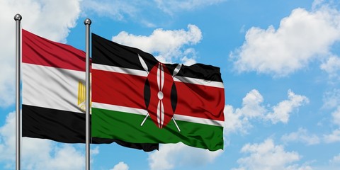 Egypt and Kenya flag waving in the wind against white cloudy blue sky together. Diplomacy concept,...