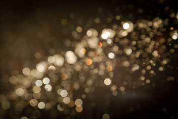 Gold abstract bokeh on black