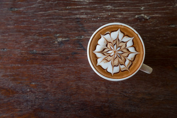 Cup of coffee with  latte art on top