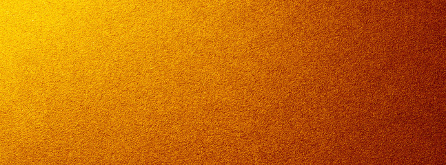 Abstract gold glitter texture. Golden powder surface.