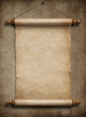 old paper scroll hanging on wall