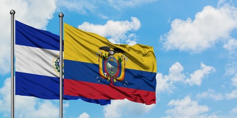 El Salvador and Ecuador flag waving in the wind against white cloudy blue sky together. Diplomacy concept, international relations.