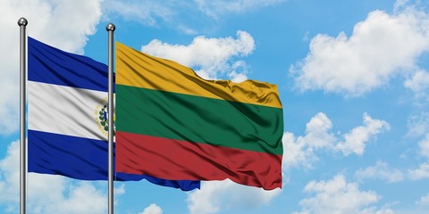 El Salvador and Lithuania flag waving in the wind against white cloudy blue sky together. Diplomacy concept, international relations.