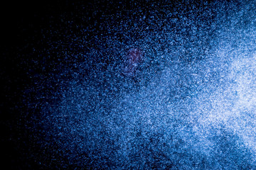 Obraz premium Blue bokeh on black