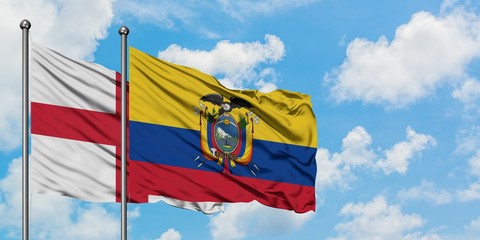 England and Ecuador flag waving in the wind against white cloudy blue sky together. Diplomacy concept, international relations.