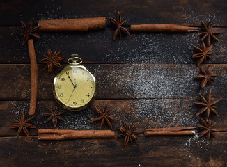 Christmas still life orange cinnamon pocket watch