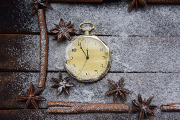 Christmas still life orange cinnamon pocket watch