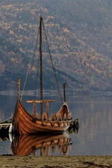viking ship in beautiful Norwegian fjord landscape