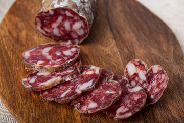 pork dry sausage on cutting board