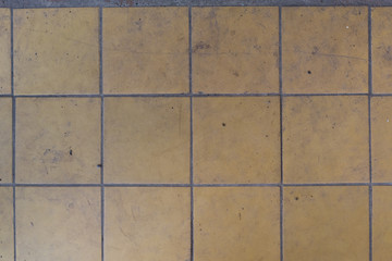 texture of dirty yellow tile wall
