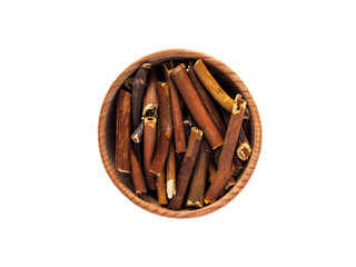 Dry stems of Comarum palustre in a wooden Cup on a white background