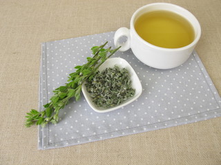A cup of tea with scotch broom