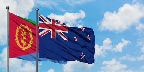 Eritrea and New Zealand flag waving in the wind against white cloudy blue sky together. Diplomacy concept, international relations.