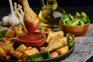 grilled chicken leg bbq dip in ketchup 