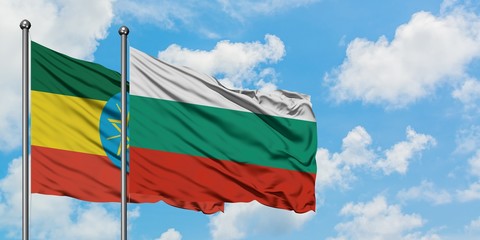 Ethiopia and Bulgaria flag waving in the wind against white cloudy blue sky together. Diplomacy concept, international relations.