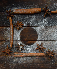 cinnamon stick frame stars star anise icing sugar for Christmas decor