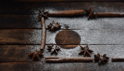 cinnamon stick frame stars star anise icing sugar for Christmas decor