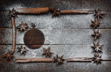 cinnamon stick frame stars star anise icing sugar for Christmas decor