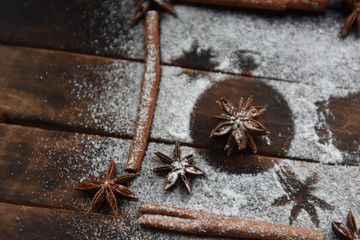 cinnamon stick frame stars star anise icing sugar for Christmas decor