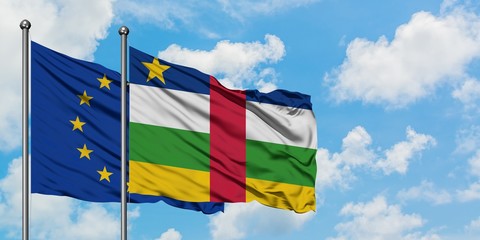 European Union and Central African Republic flag waving in the wind against white cloudy blue sky together. Diplomacy concept, international relations.