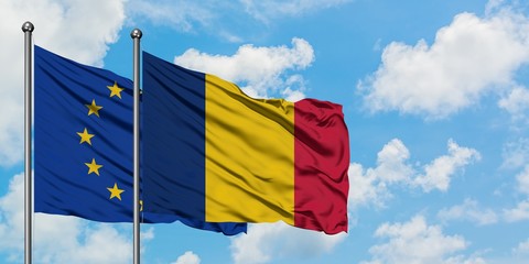 European Union and Chad flag waving in the wind against white cloudy blue sky together. Diplomacy concept, international relations.