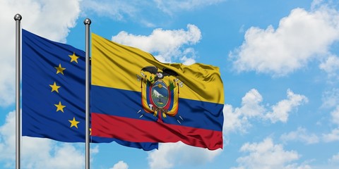 European Union and Ecuador flag waving in the wind against white cloudy blue sky together. Diplomacy concept, international relations.