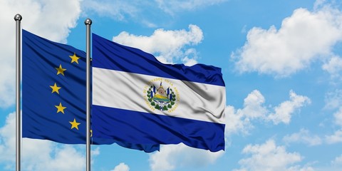 European Union and El Salvador flag waving in the wind against white cloudy blue sky together. Diplomacy concept, international relations.