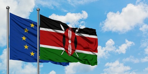 European Union and Kenya flag waving in the wind against white cloudy blue sky together. Diplomacy concept, international relations.