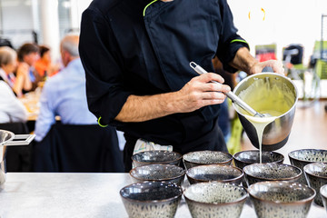 Chef preparing food for his clients