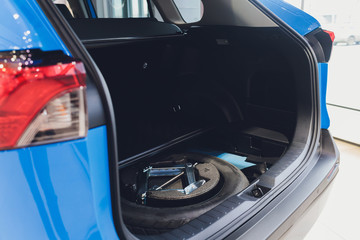 spare tire in the trunk of a modern car.