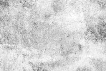 Fototapeta premium Texture of a concrete wall with cracks and scratches which can be used as a background